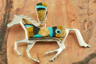 This Sterling Silver Horse Pendant is a work of art! Featuring Genuine Picture Jasper, Sleeping Beauty Turquoise and Black Jade inlaid in Sterling Silver. Reversible Horse Pendant with Contemporary Sterling Silver Design. Free 18
